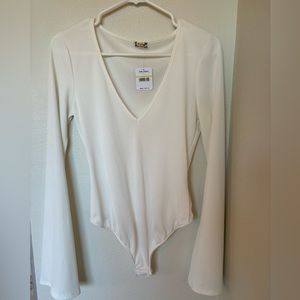 Women’s white bodysuit free people size medium